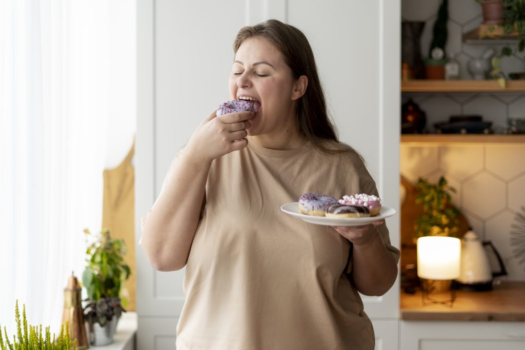person with eating disorder eating sweets