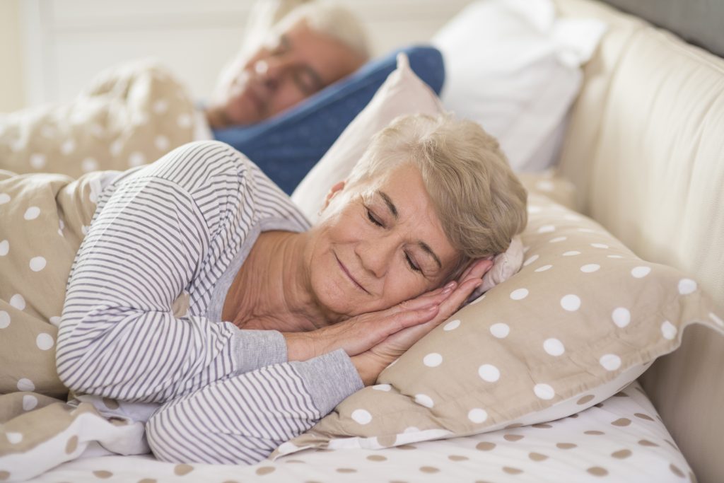 woman her husband sleeping comfortably 1